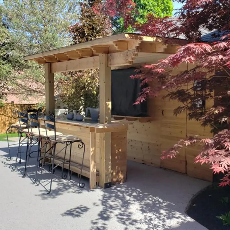 Custom wooden backyard bar and cabana built by Megapol Deck in GTA outdoor living space.