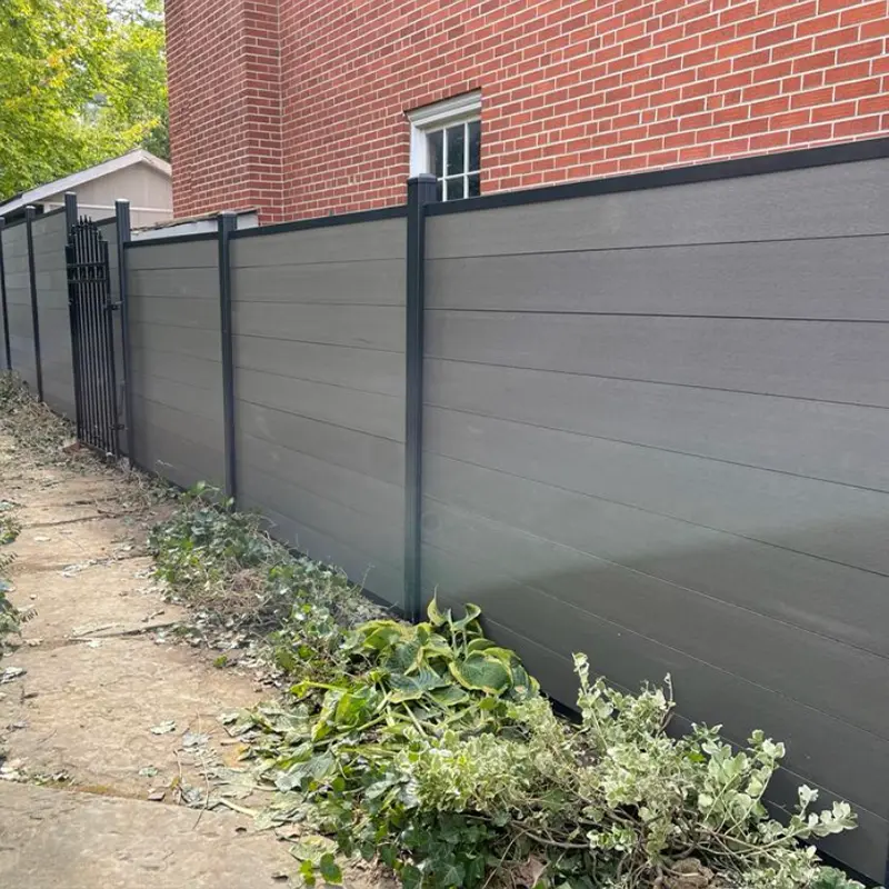 Backyard fence construction by Megapol Deck residential fence installation project