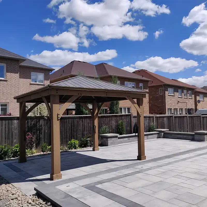 Custom metal gazebo built by Megapol Deck in residential backyard outdoor space