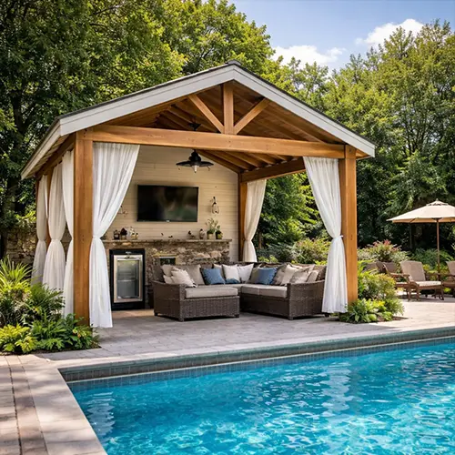 Megapol Deck poolside cabana installation with covered seating area near backyard pool
